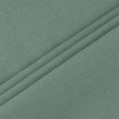 Tissu vert pour robe légère, surface texturée et uniforme, gros plan
