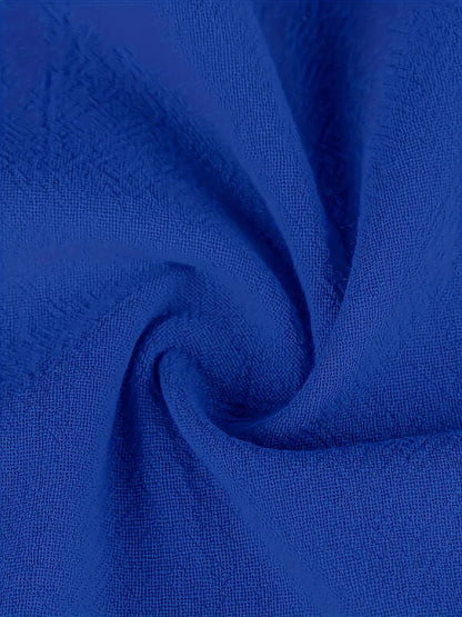Tissu de robe bleu, surface texturée avec plis
