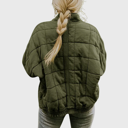 Veste matelassée oversize vert foncé, col montant et fermeture zippée, poches