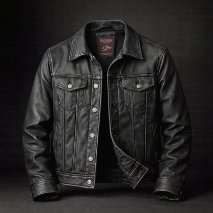 Veste motard homme en cuir noir, col à revers, poches poitrine à rabat et boutons pression.