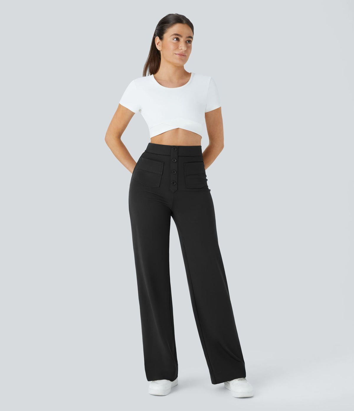 Pantalon noir à taille élastique, poches plaquées, jambes droites