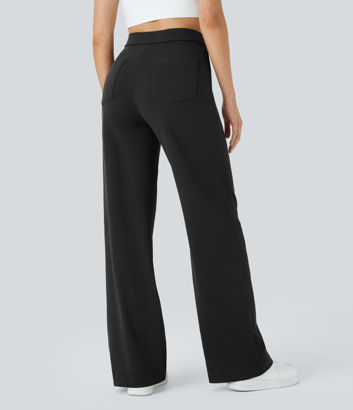 Pantalon noir à jambes droites, poches plaquées et boutonnière, taille élastique