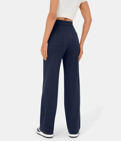 Pantalon bleu marine à taille élastique, poches plaquées et fermeture boutonnée