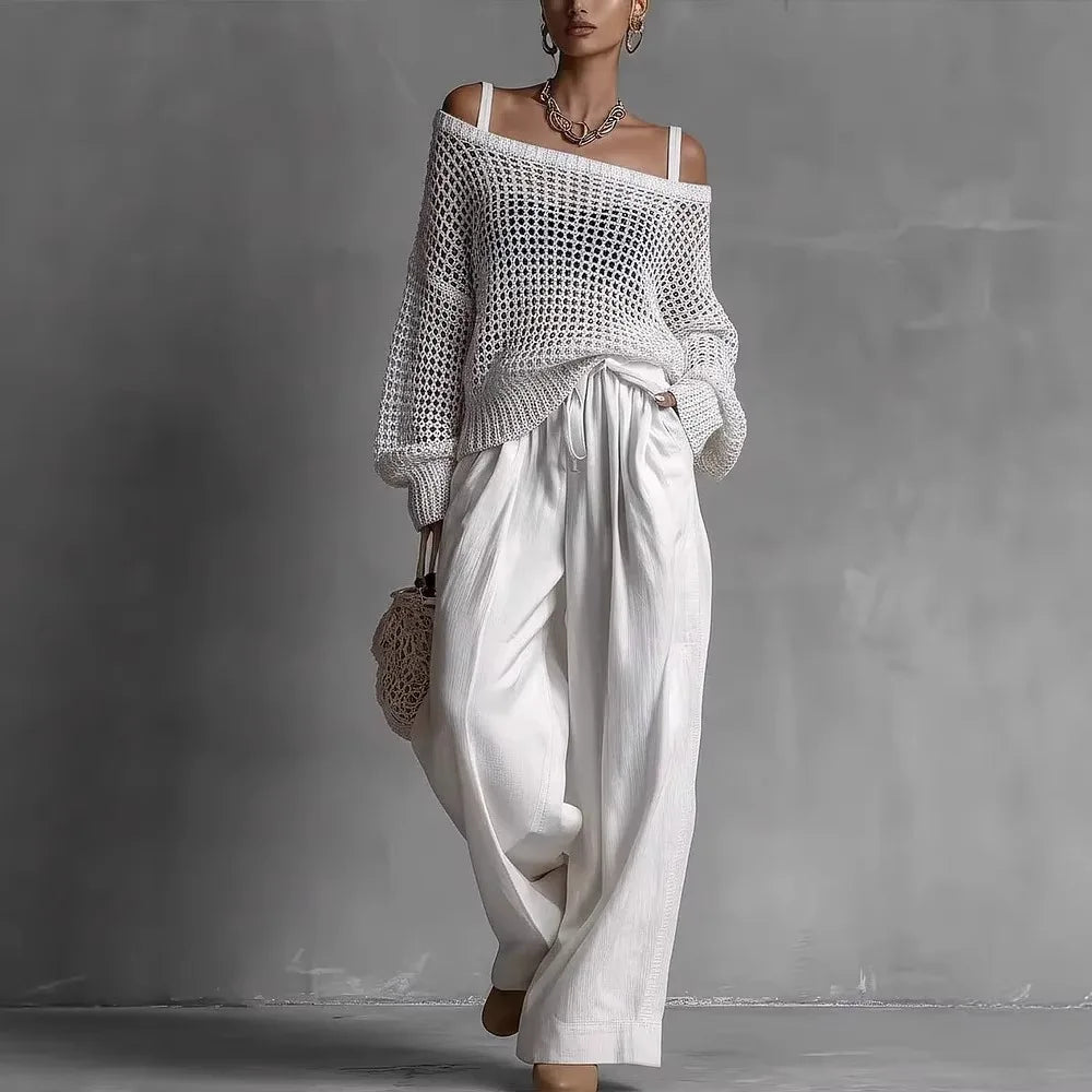 Ensemble deux pièces : pull ajouré blanc épaules dénudées et pantalon ample blanc