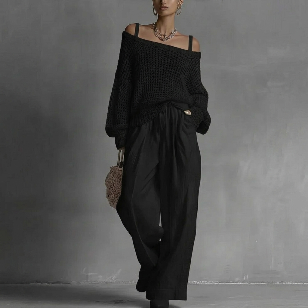 Ensemble deux pièces : pull ajouré noir épaules dénudées et pantalon ample noir