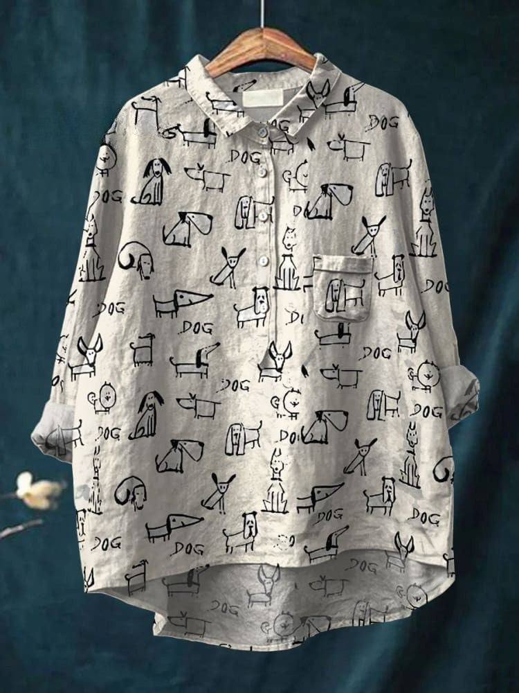 T-shirt blanc à manches longues, motif gribouillage de chiens multicolores.