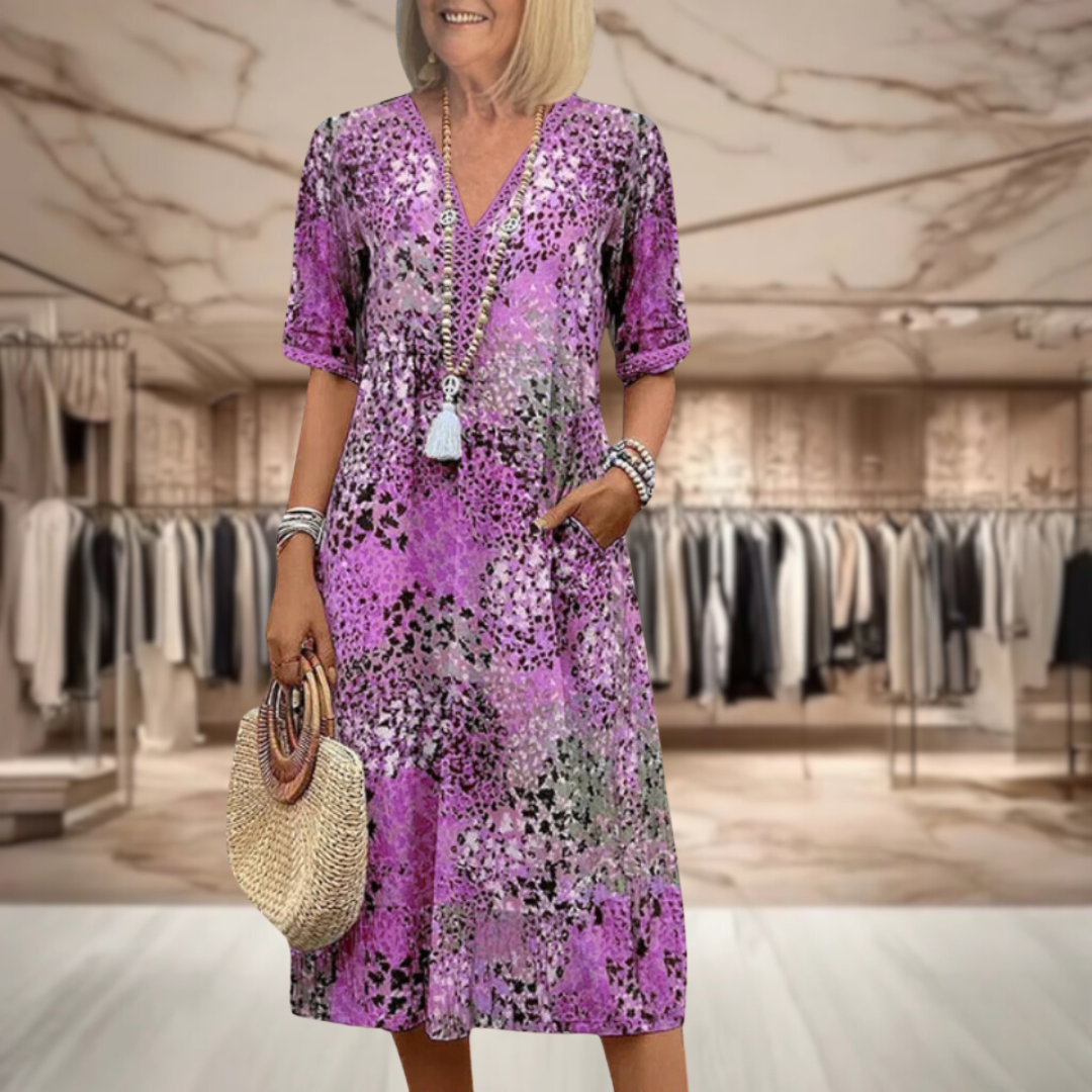 Robe mi-longue col V, manches courtes, motif multicolore sur fond violet