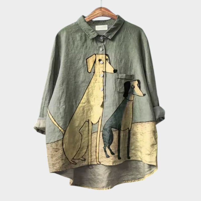 Blouse grise avec poches, motifs de chiens, col chemise boutonné.