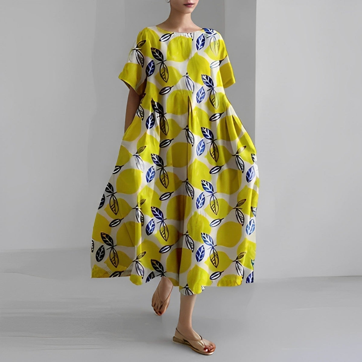 Robe bohème ample jaune à motifs feuilles bleues, manches courtes, encolure ronde