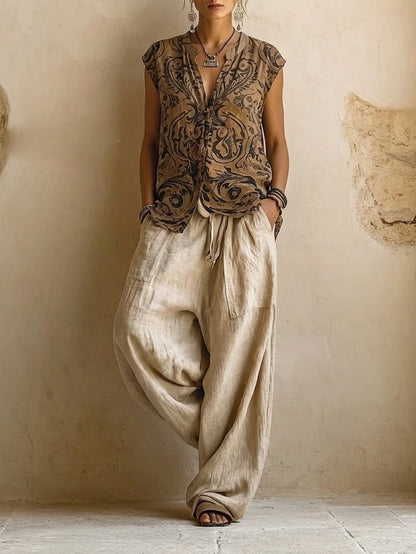 Ensemble en lin : haut sans manches boutonné imprimé, pantalon ample écru à taille élastique.