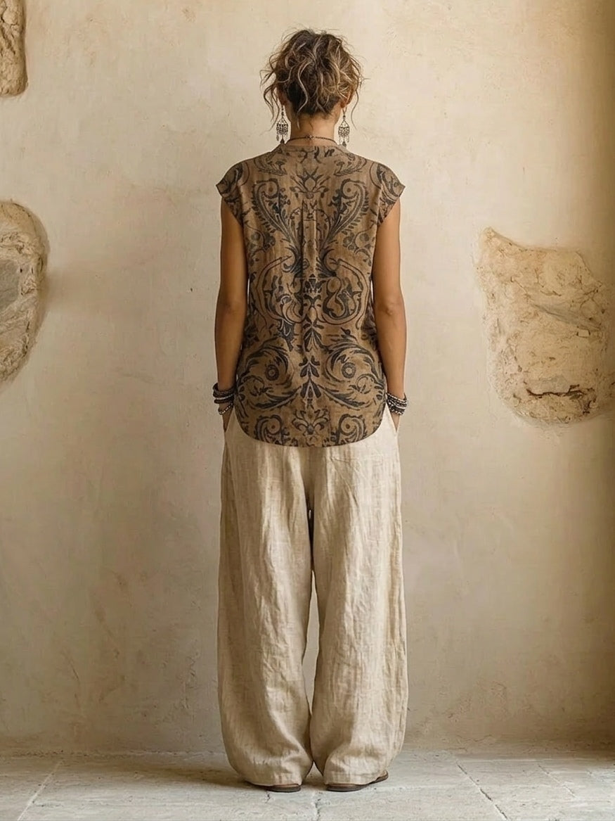 Ensemble en lin : haut imprimé au dos, pantalon ample écru fluide.