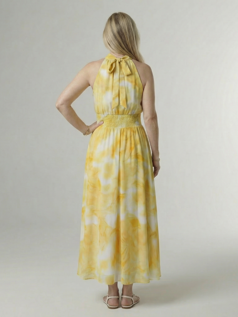 Robe midi Sylin jaune au dos noué, fronces à la taille, jupe évasée imprimée
