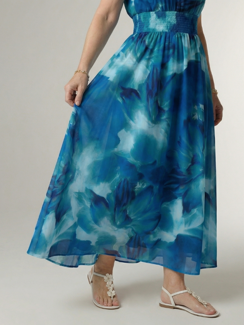 Robe midi Sylin bleue à licou froncé, imprimé floral, taille froncée et évasée