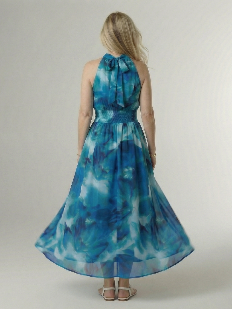 Robe midi Sylin bleue au dos noué, fronces à la taille, jupe évasée imprimée