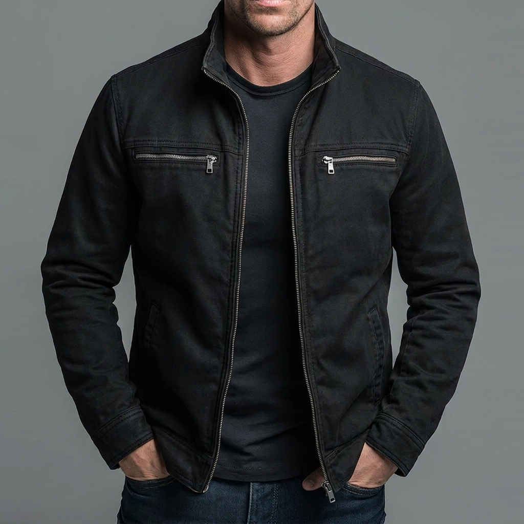 Veste vintage noire à fermeture zippée, col montant et deux poches poitrine zippées
