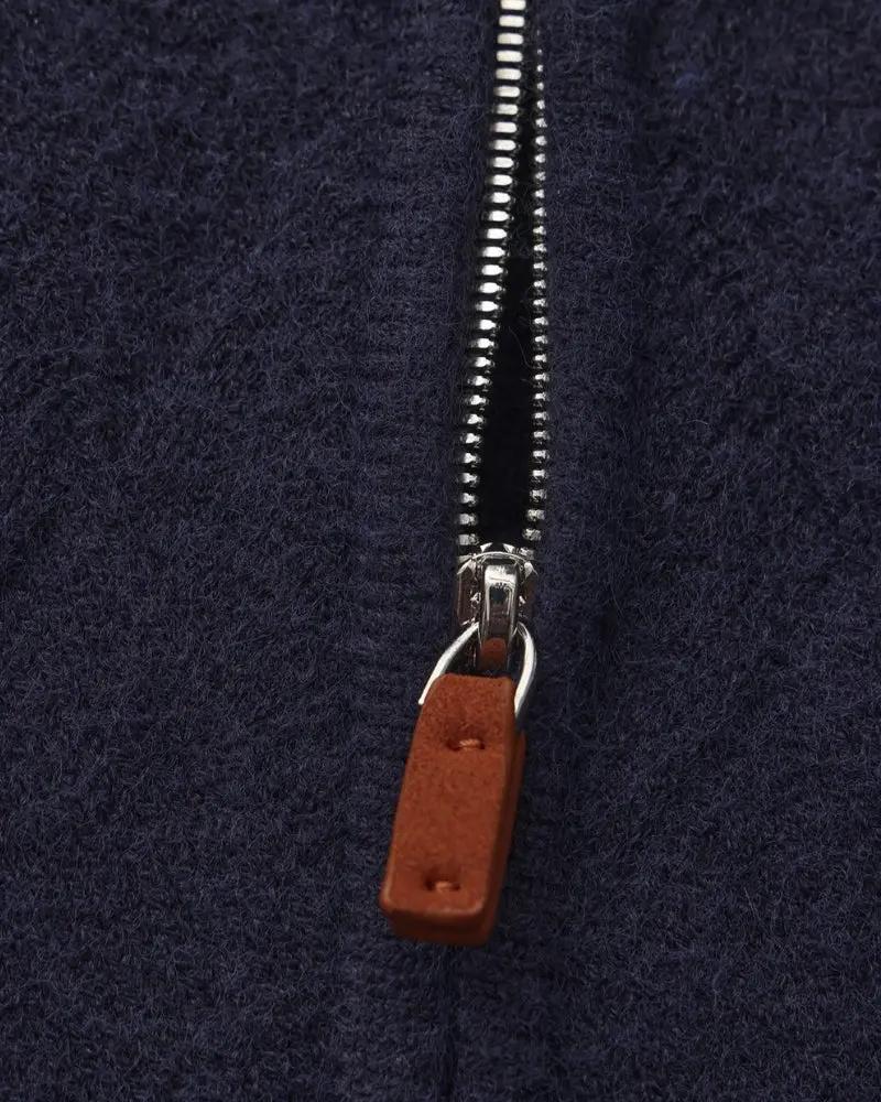 Gilet en tricot marine, fermeture éclair avec tirette marron en cuir