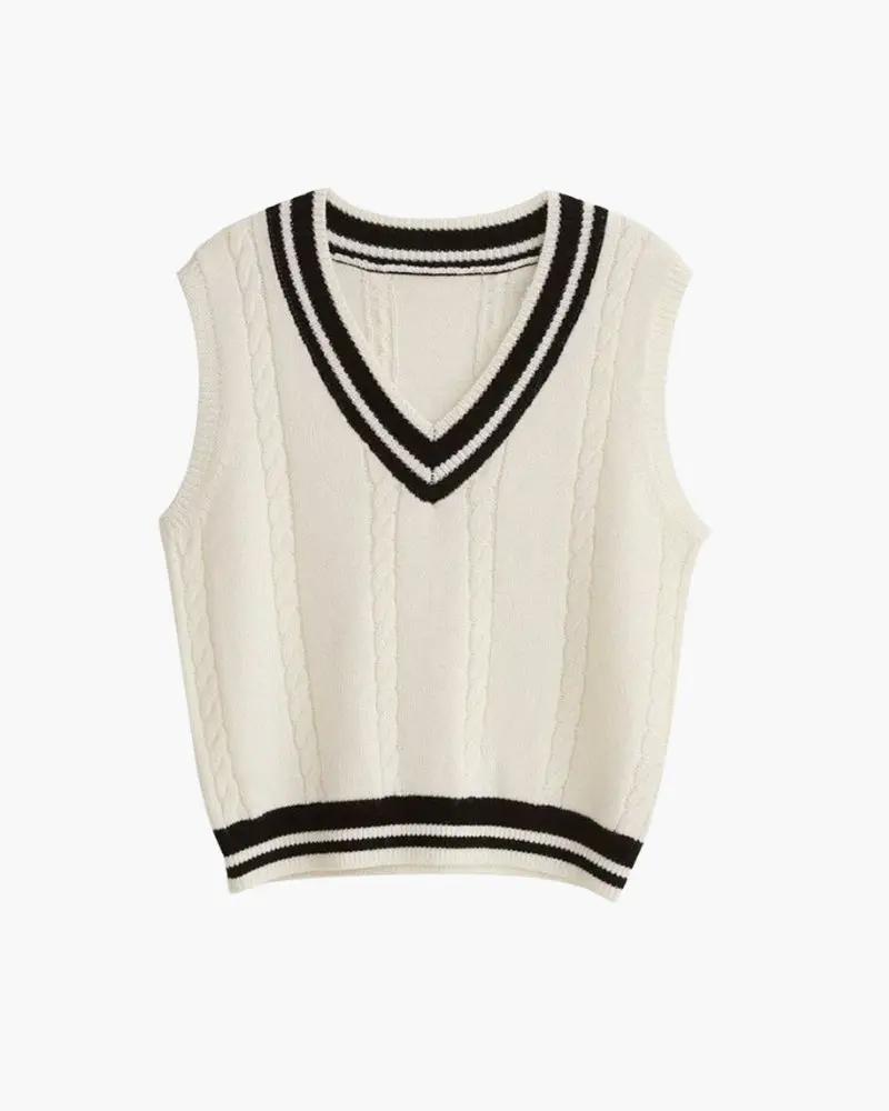 Gilet en maille torsadée blanc cassé, encolure V et bordures noires